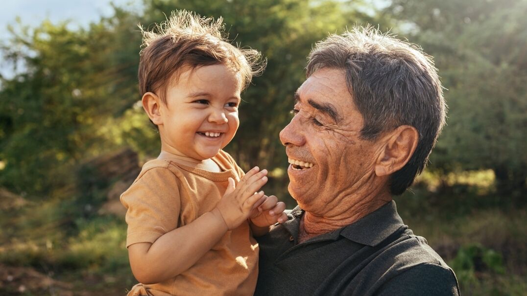 Grandparent holding child